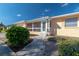 Welcoming front entry with light blue door, screened porch, and landscaped walkway at 3873 21St N Ave, St Petersburg, FL 33713