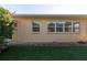 Tan house exterior with multiple windows at 3873 21St N Ave, St Petersburg, FL 33713