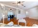 Spacious living room with open layout to dining area, hardwood floors, lots of light and modern furnishings at 3873 21St N Ave, St Petersburg, FL 33713