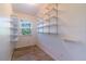 White storage room with ample shelving at 3873 21St N Ave, St Petersburg, FL 33713