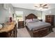 Spacious Primary bedroom with large bed and plenty of storage at 39822 Harmon Grove Ct, Zephyrhills, FL 33540