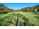Fenced-in dog park with grassy area for pets at 39822 Harmon Grove Ct, Zephyrhills, FL 33540
