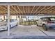 Parking with two vehicles parked in designated spots at 399 150Th Ave # A203, Madeira Beach, FL 33708