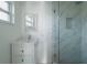 Modern bathroom with a large marble shower and vanity at 1009 19Th Sw St, Largo, FL 33770