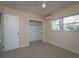 Bedroom with closet and window, featuring light walls and flooring at 1009 19Th Sw St, Largo, FL 33770