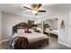 Large bedroom with a king-size bed and ceiling fan at 1108 Pelican S Dr, St Petersburg, FL 33707