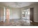 Bright and airy bedroom with tile flooring and sliding glass door to the lanai at 29417 Caddyshack Ln, San Antonio, FL 33576