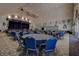 Spacious community room with round tables and chairs at 29417 Caddyshack Ln, San Antonio, FL 33576