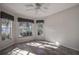 Bright dining area with three windows and tile flooring at 29417 Caddyshack Ln, San Antonio, FL 33576