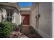 Brick walkway leading to a brown front door at 29417 Caddyshack Ln, San Antonio, FL 33576