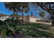 Charming home featuring a well-maintained lawn, mature trees and a two-car garage at 29417 Caddyshack Ln, San Antonio, FL 33576