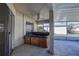 Screened patio with hot tub and ceiling fan at 29417 Caddyshack Ln, San Antonio, FL 33576
