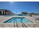 Resort-style pool and spa with lounge chairs at 29417 Caddyshack Ln, San Antonio, FL 33576
