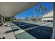 Enjoy a friendly game of shuffleboard under the covered outdoor recreation area at 29417 Caddyshack Ln, San Antonio, FL 33576