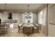 Bright dining room with a large table and comfortable seating for eight at 3819 71St N St, St Petersburg, FL 33709