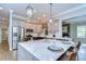 Gourmet kitchen with stainless steel appliances and a center island with seating at 4643 John Moore Rd, Brandon, FL 33511