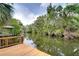 Scenic water view from the dock, surrounded by lush greenery and serene landscapes at 4643 John Moore Rd, Brandon, FL 33511