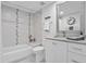 Clean bathroom with updated vanity and bathtub shower combo at 4750 Dolphin Cay S Ln # 308, St Petersburg, FL 33711