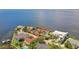 Waterfront property with tennis court and two houses at 5029 W San Miguel St, Tampa, FL 33629