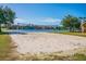 Beach volleyball court near the lake at 9320 Lake Chase Island Way, Tampa, FL 33626