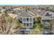 Two-story house with a balcony and white picket fence, nicely landscaped at 10130 Balcony St, New Port Richey, FL 34655