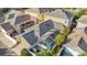 Aerial view of house with pool and fenced backyard at 10130 Balcony St, New Port Richey, FL 34655