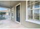 Balcony access from home with exterior door and windows at 10130 Balcony St, New Port Richey, FL 34655