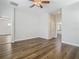 Spacious bedroom with hardwood floors and access to bathroom at 10130 Balcony St, New Port Richey, FL 34655