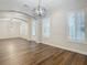 Spacious dining room featuring hardwood floors and natural light at 10130 Balcony St, New Port Richey, FL 34655