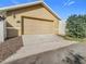 Attached garage with ample driveway space at 10130 Balcony St, New Port Richey, FL 34655