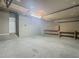 Garage with workbench and storage; interior access at 10130 Balcony St, New Port Richey, FL 34655