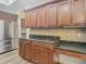 Modern kitchen with stainless steel appliances and granite countertops at 10130 Balcony St, New Port Richey, FL 34655