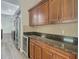 Kitchen with stainless steel appliances and granite countertops at 10130 Balcony St, New Port Richey, FL 34655