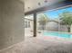 View of a refreshing pool area from covered patio at 10130 Balcony St, New Port Richey, FL 34655