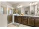 Elegant bathroom with a large shower and double vanity at 10431 Machrihanish Cir, San Antonio, FL 33576