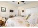 Bedroom with a queen-size bed and TV at 10431 Machrihanish Cir, San Antonio, FL 33576