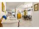 Charming dining room featuring a round table and yellow hutch at 10431 Machrihanish Cir, San Antonio, FL 33576