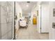 Bright and spacious entryway with tile floors and a glimpse into the living room at 10431 Machrihanish Cir, San Antonio, FL 33576