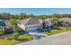 Single-story home with a two-car garage and nicely landscaped yard at 10431 Machrihanish Cir, San Antonio, FL 33576