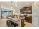 Eat-in kitchen with granite countertops and stainless steel appliances at 10431 Machrihanish Cir, San Antonio, FL 33576