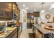 Modern kitchen with stainless steel appliances at 10431 Machrihanish Cir, San Antonio, FL 33576