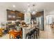 Spacious kitchen with granite countertops, stainless steel appliances, and an island at 10431 Machrihanish Cir, San Antonio, FL 33576