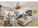 Spacious living room with large sectional sofa at 10431 Machrihanish Cir, San Antonio, FL 33576