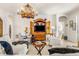 Bright living room featuring a comfy seating area and built-in entertainment center at 10431 Machrihanish Cir, San Antonio, FL 33576