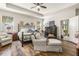 Luxurious main bedroom with plush seating and large windows at 10431 Machrihanish Cir, San Antonio, FL 33576