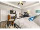 Main bedroom featuring a cozy sitting area and ample closet space at 10431 Machrihanish Cir, San Antonio, FL 33576