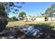 Large backyard with grassy area and detached garage at 1360 Prescott S St, St Petersburg, FL 33712