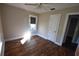 Bright bedroom with hardwood floors and ceiling fan at 1360 Prescott S St, St Petersburg, FL 33712