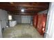 Attached garage with washer, dryer, and ample storage space at 1360 Prescott S St, St Petersburg, FL 33712