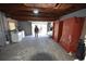 View of garage with open door to outside at 1360 Prescott S St, St Petersburg, FL 33712